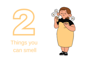 Girl smelling flowers with wording 2 things you can smell