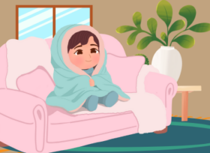 Person sat on sofa wrapped in a blanket